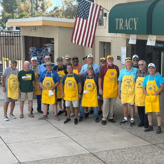 Lions volunteers outside the Tracy concession stand.